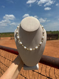 The Golden Pearl Necklace